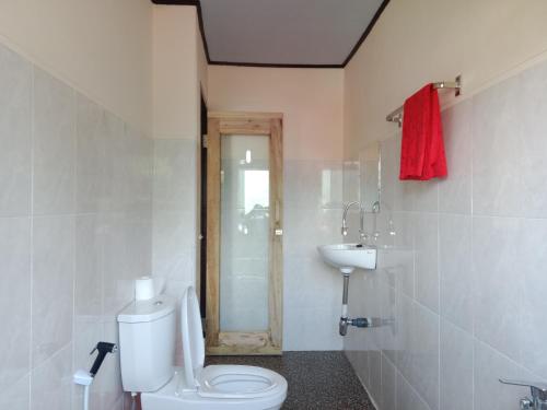 Koupelna v ubytování Toraja Sanggalangi Homestay