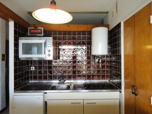 A kitchen or kitchenette at Appartement Port-la-Nouvelle, 2 pièces, 4 personnes - FR-1-229C-159