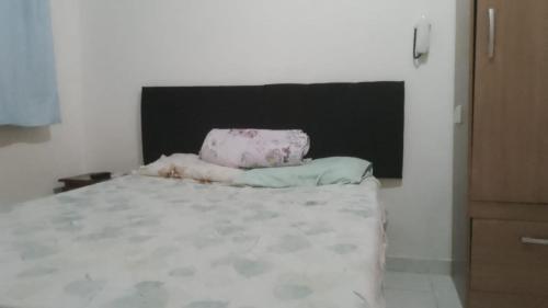 Cama o camas de una habitación en Residencial Laranjal