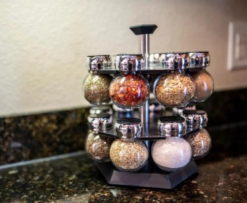 a rack of glass ornaments on a counter at Creekside Cottage*Hot Tub*Entire Home-Pigeon Forge in Pigeon Forge
