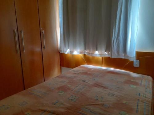 Postel nebo postele na pokoji v ubytování Residencial Thermas do Bandeirante