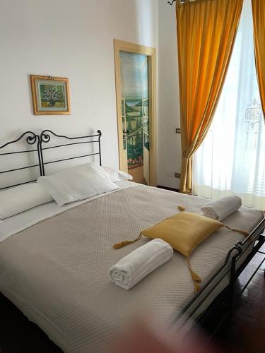 Postel nebo postele na pokoji v ubytování Villa Mirella