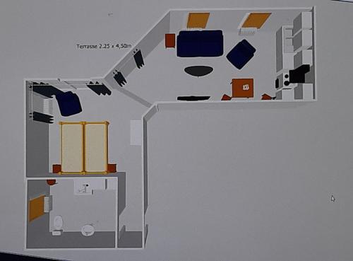 a floor plan of a room with blue and yellow furniture at Ferienwohnung Heimsheim in Heimsheim