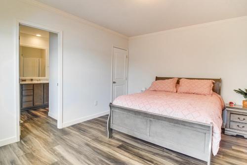 a white bedroom with a bed and a dresser at Grand Lake Views Pet-Friendly Jay Getaway! in Jay