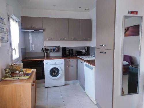 Η κουζίνα ή μικρή κουζίνα στο Maison Cosy à proximité de la Plage