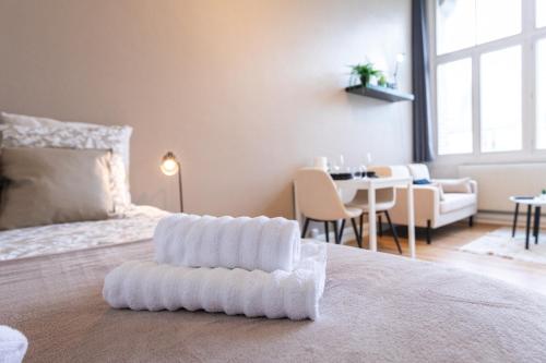 Ένα ή περισσότερα κρεβάτια σε δωμάτιο στο Appartement hyper centre