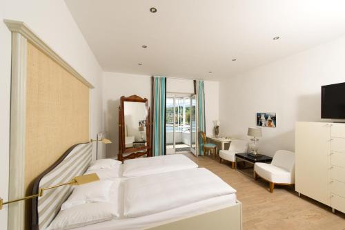 Postel nebo postele na pokoji v ubytování Seehotel Hubertushof