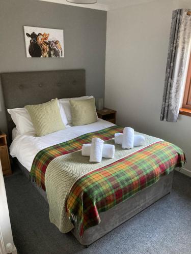 Ένα ή περισσότερα κρεβάτια σε δωμάτιο στο Highland Croft B&B