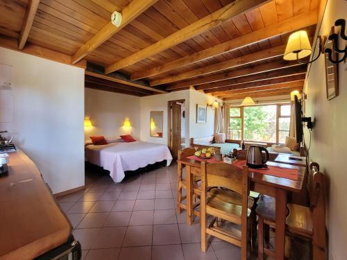 Ένα ή περισσότερα κρεβάτια σε δωμάτιο στο Apart Hotel Del Arroyo