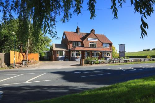 a house on the side of a road at The George Carvery & Hotel in Ripon