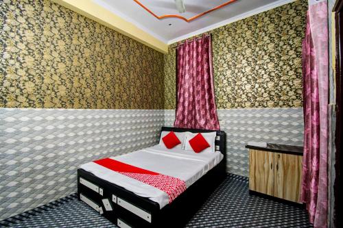 Cama o camas de una habitación en OYO Hotel Rao Residency
