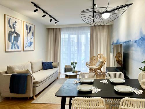 Χώρος καθιστικού στο Apartament ODNOWA M29 basen i jacuzzi