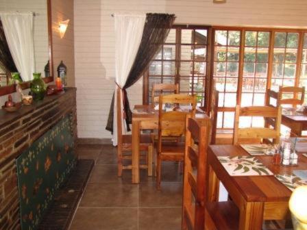 En restaurang eller annat matställe på Mzanzi Rock Guesthouse