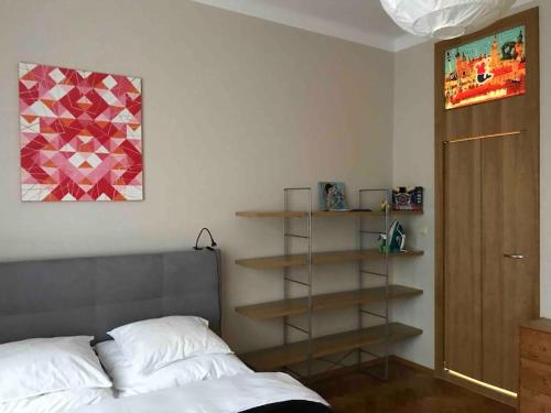 a bedroom with a bed and a book shelf at Great place to stay in Warsaw in Warsaw