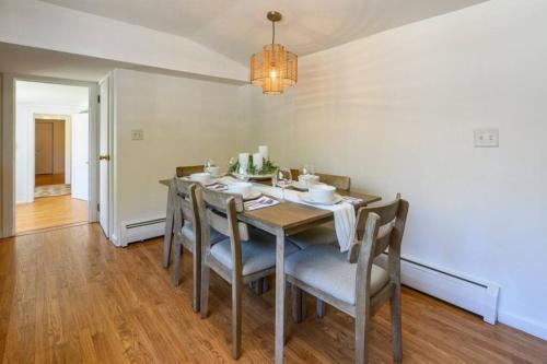 a dining room with a table and chairs at Trail-side Haven Retreat! Pet friendly in North Haven