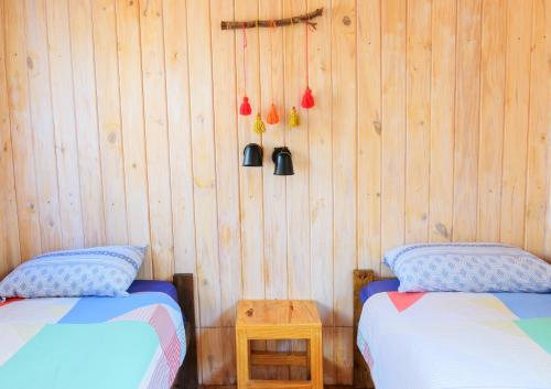 Un ou plusieurs lits dans un hébergement de l'établissement Glamping El Obrador Tilcara
