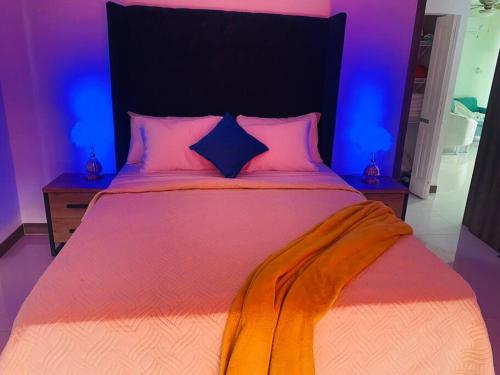 Łóżko lub łóżka w pokoju w obiekcie Ocean view Oasis