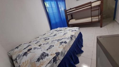 Ένα ή περισσότερα κρεβάτια σε δωμάτιο στο Hostal Villa Mayte Coronado