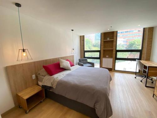 Cama o camas de una habitación en Events and traveling apartment on Bogotá