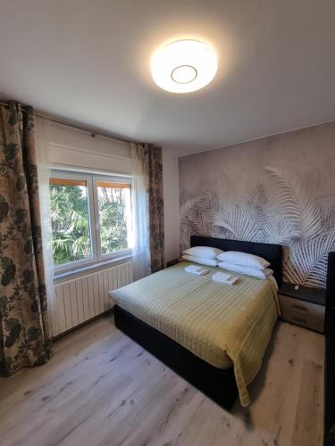 Katil atau katil-katil dalam bilik di Bilocale Villesse