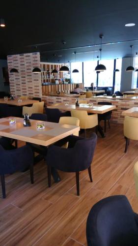 Εστιατόριο ή άλλο μέρος για φαγητό στο Alvin Comfort Hotel