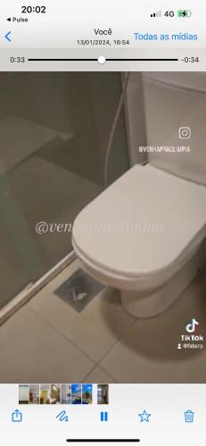 a picture of a white toilet in a room at Olímpia Park Resort in Olímpia