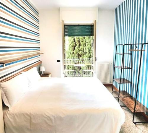 A bed or beds in a room at Residence Corallo