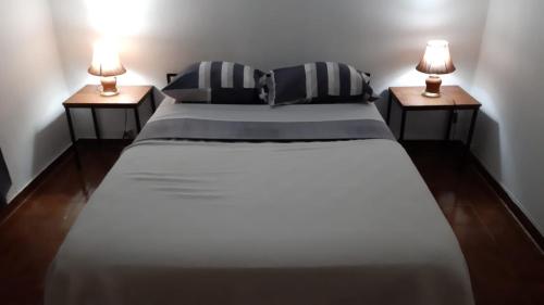 Tempat tidur dalam kamar di Departamento Céntrico