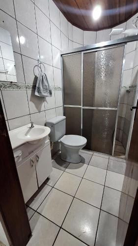 Koupelna v ubytování Casa com quintal próxima de Torres