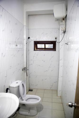 Koupelna v ubytování Super Spot Guest House