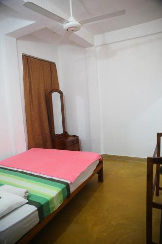 Postel nebo postele na pokoji v ubytování Super Spot Guest House