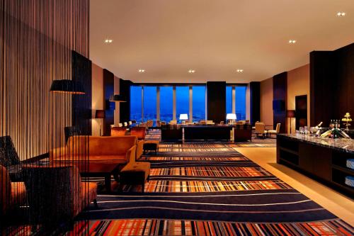 a hotel lobby with a view of the city at The Westin Sendai in Sendai