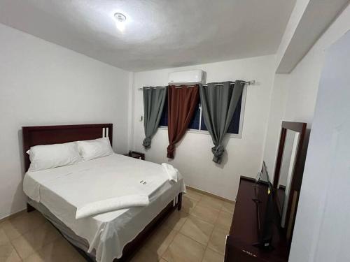 Ліжко або ліжка в номері Apartamento pisó 1 parqueo, piscina, terraza y más