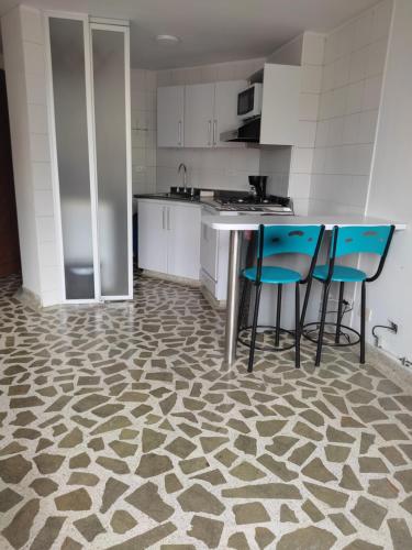 Kuchyň nebo kuchyňský kout v ubytování Bonito apartamento con excelente ubicación