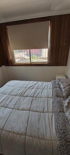 מיטה או מיטות בחדר ב-Mauge's Bed & Breakfast