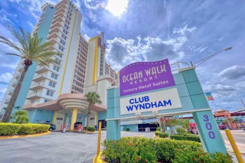 a sign in front of a club windham building at Luxury 12th Floor 2 BR Condo Direct Oceanfront Wyndham Ocean Walk Resort Daytona Beach | 1201 in Daytona Beach