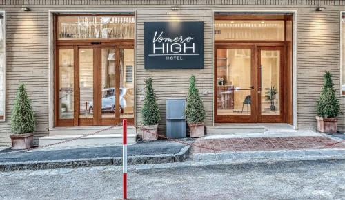 a building with a sign that reads vanguard high at Vomero High Hotel in Naples