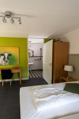 Katil atau katil-katil dalam bilik di Hoeve Montigny B&B