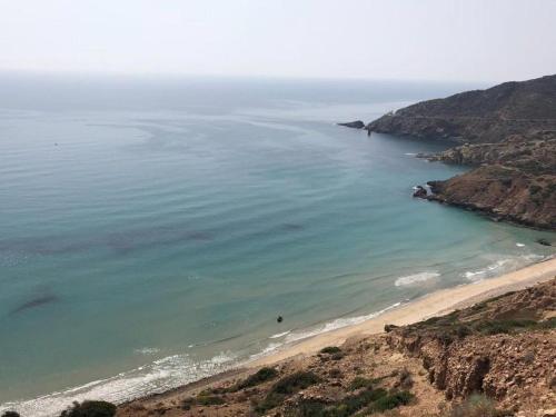 an aerial view of a beach next to a mountain at Luxury Apartment Nador Jadid Only Family in Nador