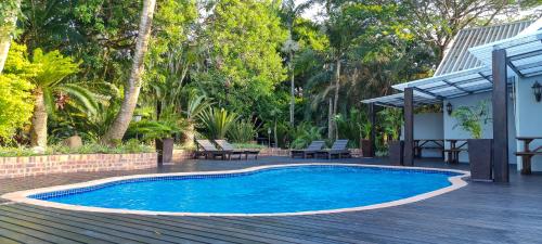 Πισίνα στο ή κοντά στο Leopard Tree Lodge