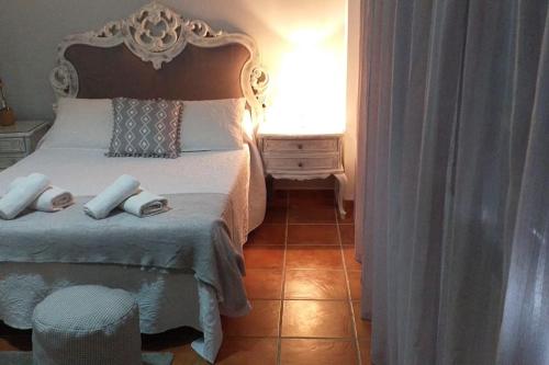 En eller flere senge i et værelse på Casa Rodríguez II - La Herradura