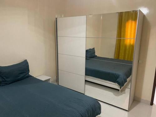 Krevet ili kreveti u jedinici u objektu Appartement à Résidence Mamouja