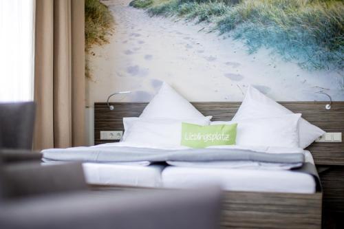Hotel Das Kronprinzにあるベッド