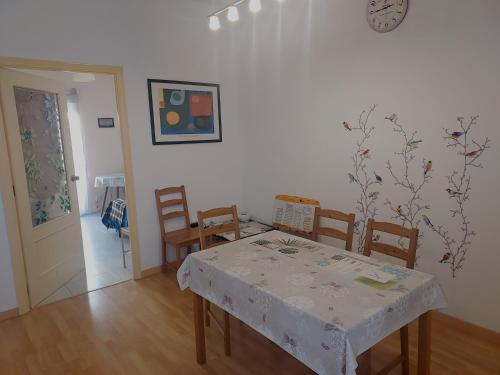 a dining room with a table and some chairs at Cozy Private Room 1 in Valencia