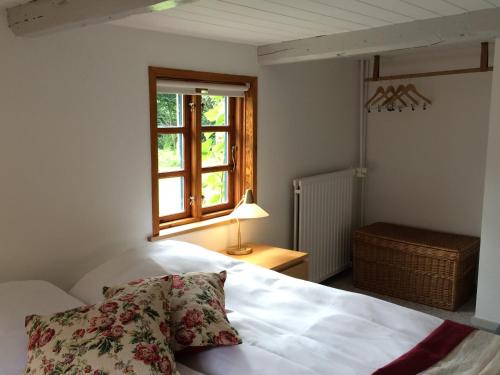 Un pat sau paturi într-o cameră la Villa Zira