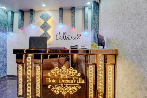 a hotel dream villa lobby with a hotel dream villa sign at Collection O Hotel Dream Villa in Patna