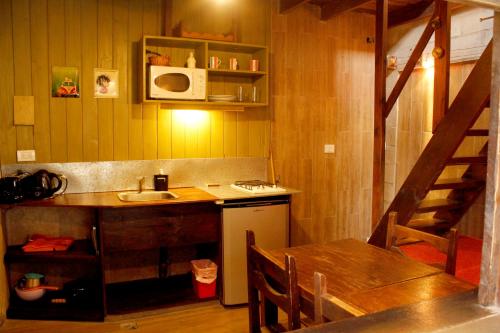 Køkken eller tekøkken på Cabañas Recanto