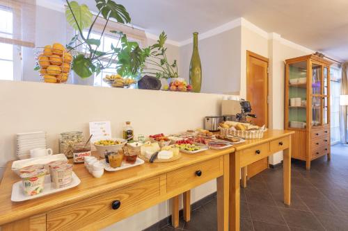 a counter with a bunch of food on it at Hotel San Telmo in Santa Cruz de la Palma