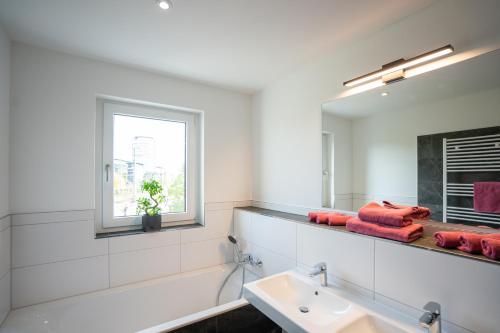 Foto Cozy City Dream Apartment mit Terrasse und Parkplatz - 90m² 3