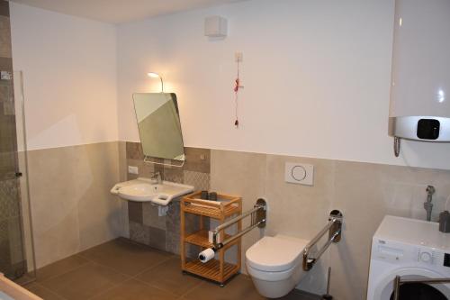Ванная комната в Ferienwohnung Goldener Löwe